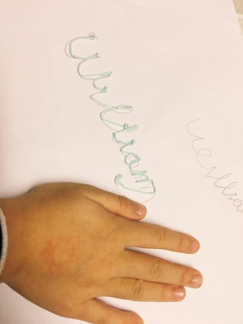 Step One: Use a pencil to write a name on paper and Draw it using 3Doodler Pen, make letters connected